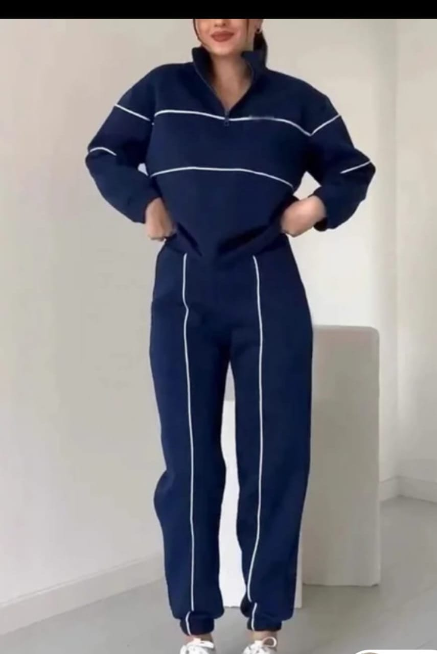 Tuta blu navy coordinata con profili bianchi